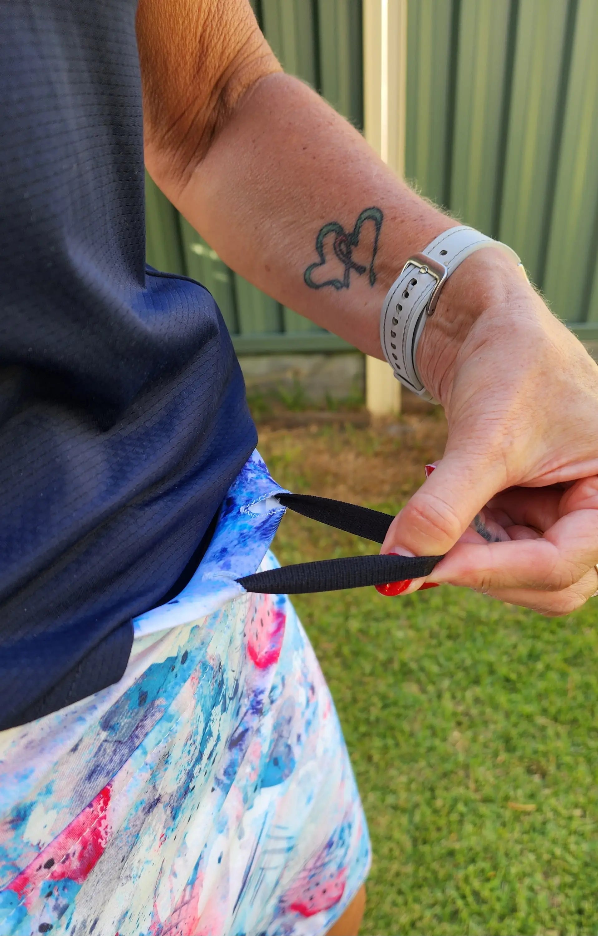 Amelia Longer Skort with Pockets - water colours in blue pink and white. Drawer string 