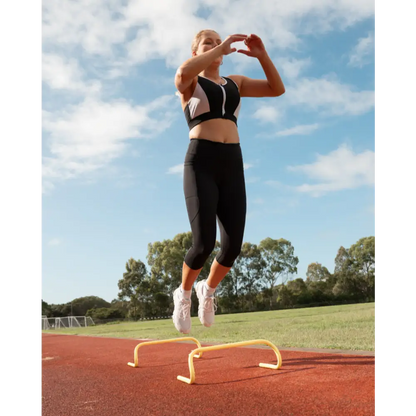 Gmaxx 'ATTACK BLACK' Active 3/4 Gmaxx 'ATTACK Black Active 3/4 Leggings - A sleek, 3/4 black high-performance legging designed for all physical activities. It features two large side pockets and a small fob/coin pocket for secure storage.