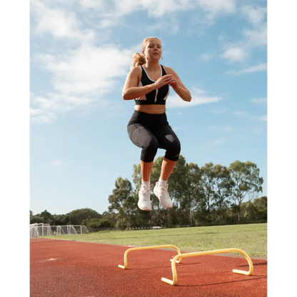 Gmaxx 'ATTACK Black Active 3/4 Leggings - A sleek, 3/4 black high-performance legging designed for all physical activities. It features two large side pockets and a small fob/coin pocket for secure storage.