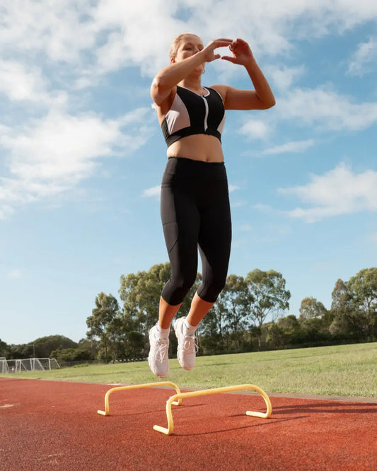 Gmaxx 'ATTACK BLACK' Active 3/4 Gmaxx 'ATTACK Black Active 3/4 Leggings - A sleek, 3/4 black high-performance legging designed for all physical activities. It features two large side pockets and a small fob/coin pocket for secure storage.