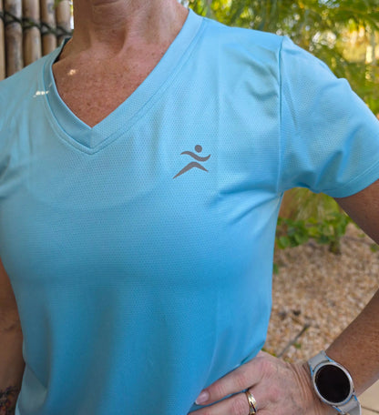 Light blue gmaxx mesh v neck activewear top with gray abstract logo lightweight breathable fabric