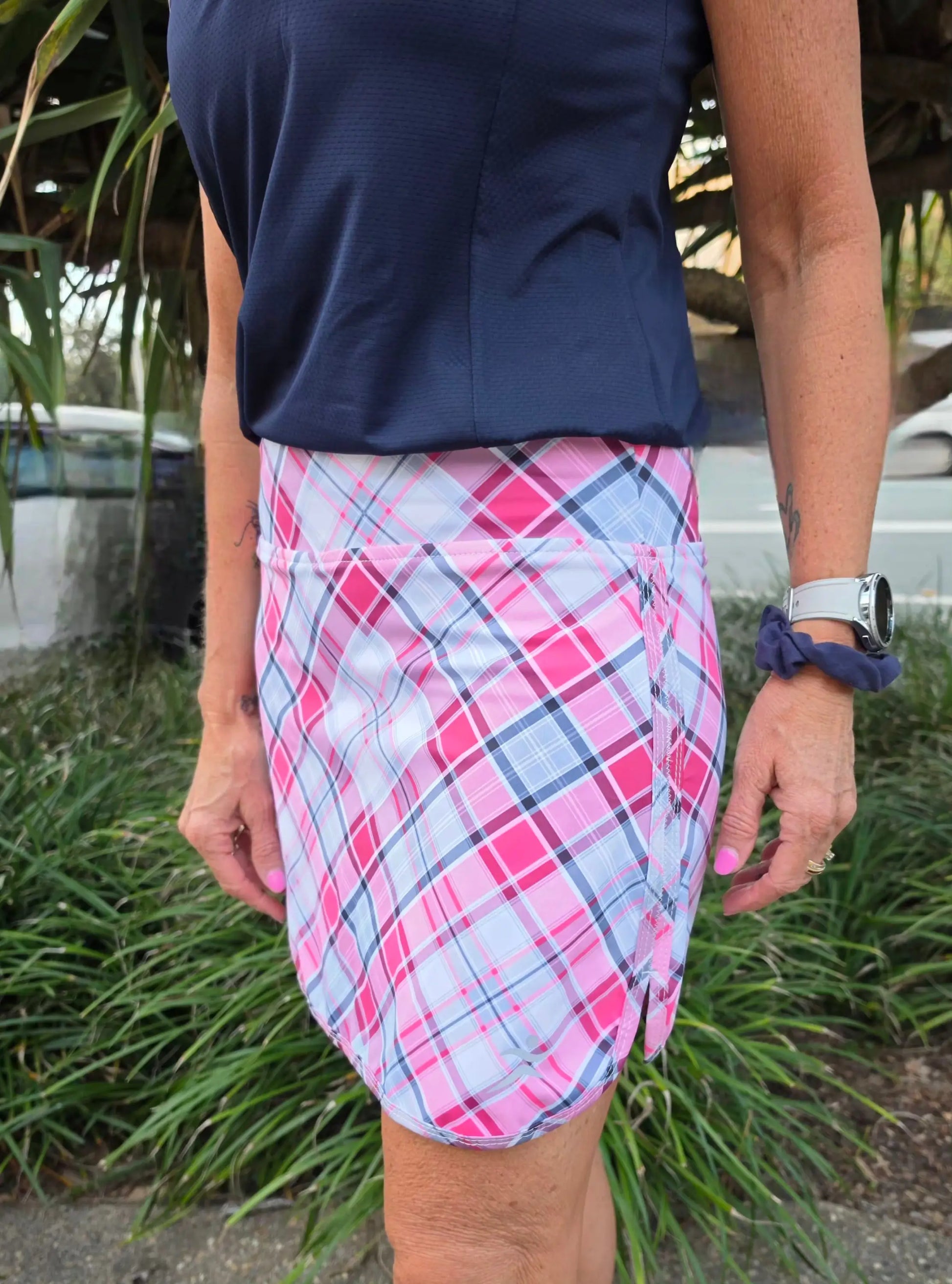 Harper skort with pockets in pink white and navy plaid mini skirt design with a fitted style