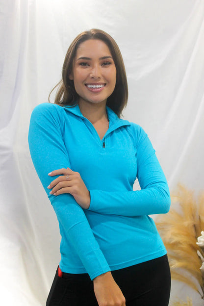 Kirra Half Zip Sports Tops. This unique composition of cotton, polyester and spandex offers an optimal combination of softness, stretch and comfort in this modern heather half-zip long sleeve.