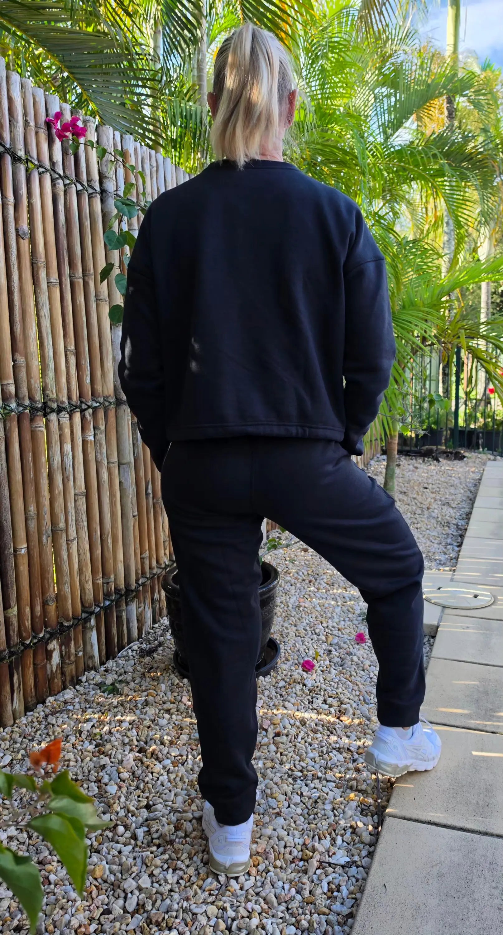 Black oversized sweatshirt with ribbed cuffs and hem paired with kozy fleecy black fleecy pants with pockets winter wardrobe winner