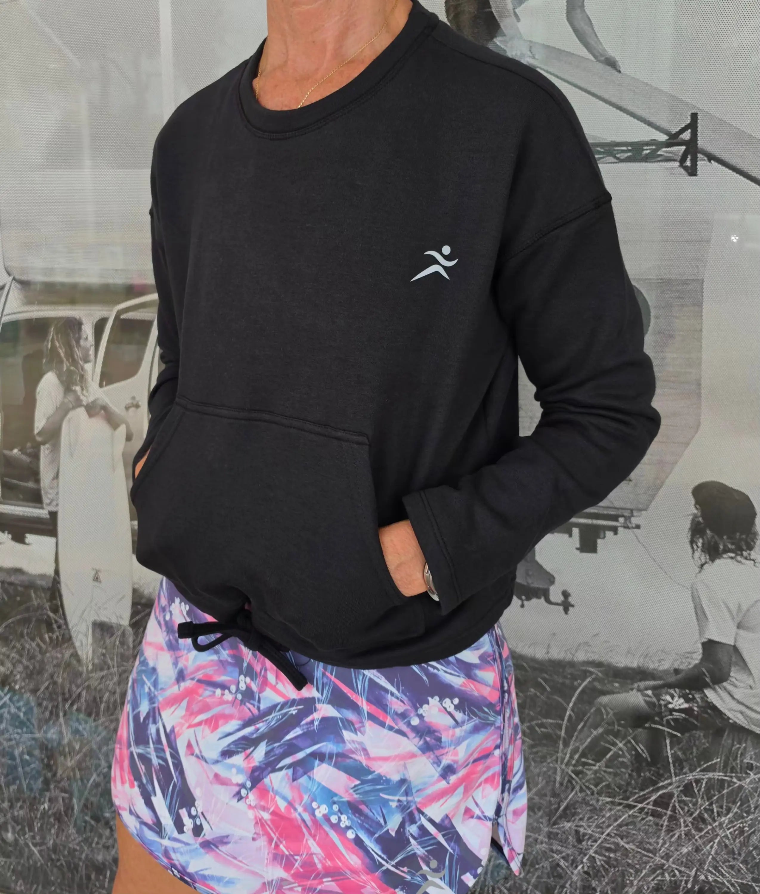 Black kozy fleecy top activewear sweatshirt with cotton polyester fabric white abstract runner logo and drawstring pockets
