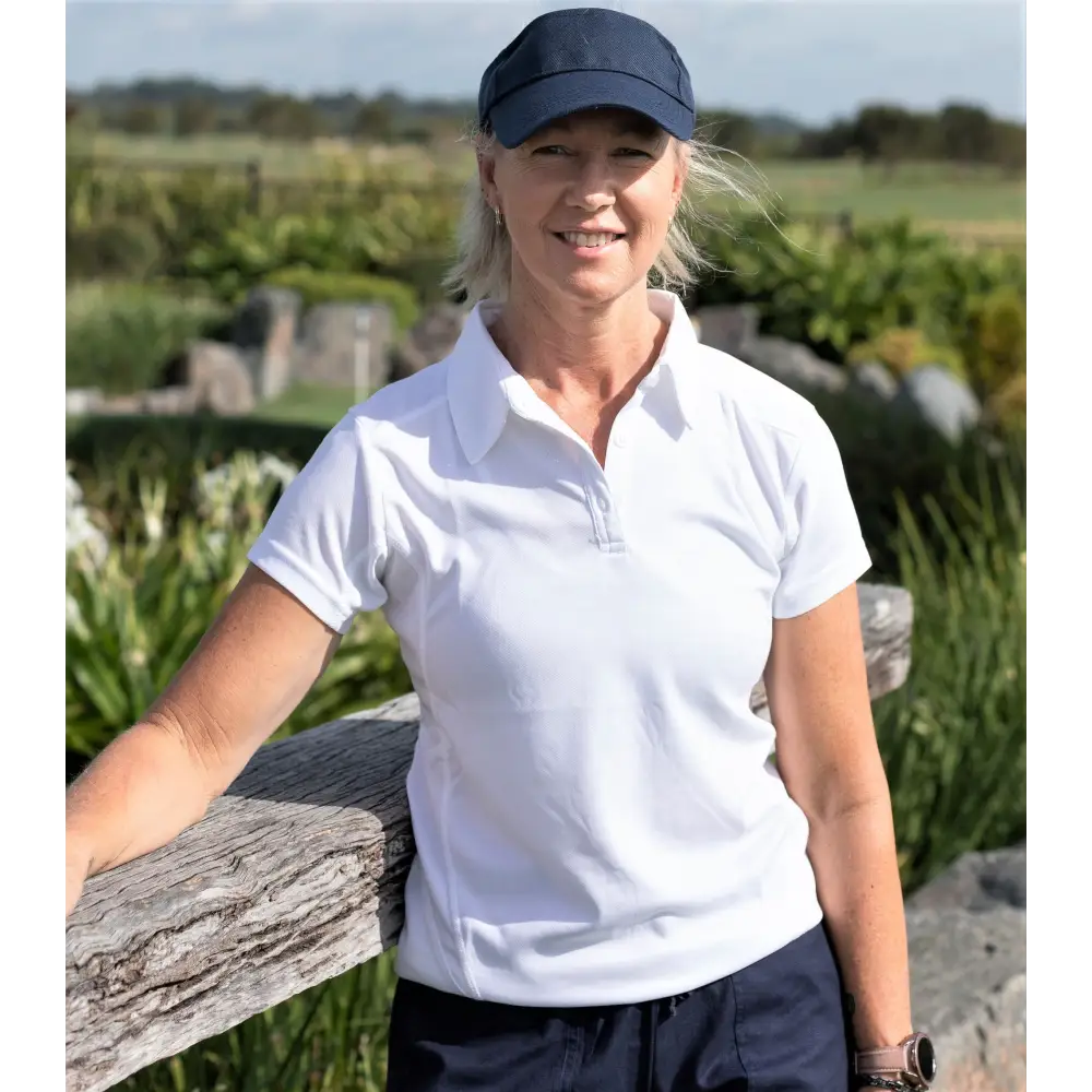 Ladies Accelerator Polo. A contemporary white Polo  suitable for both sporting, corporate and casual wear