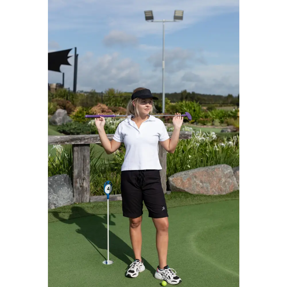 Black "Maggie Short" for women, featuring a flat front with drawstring, elastic back, side pockets, and split cuffs, designed for a relaxed, comfortable fit just above the knee.