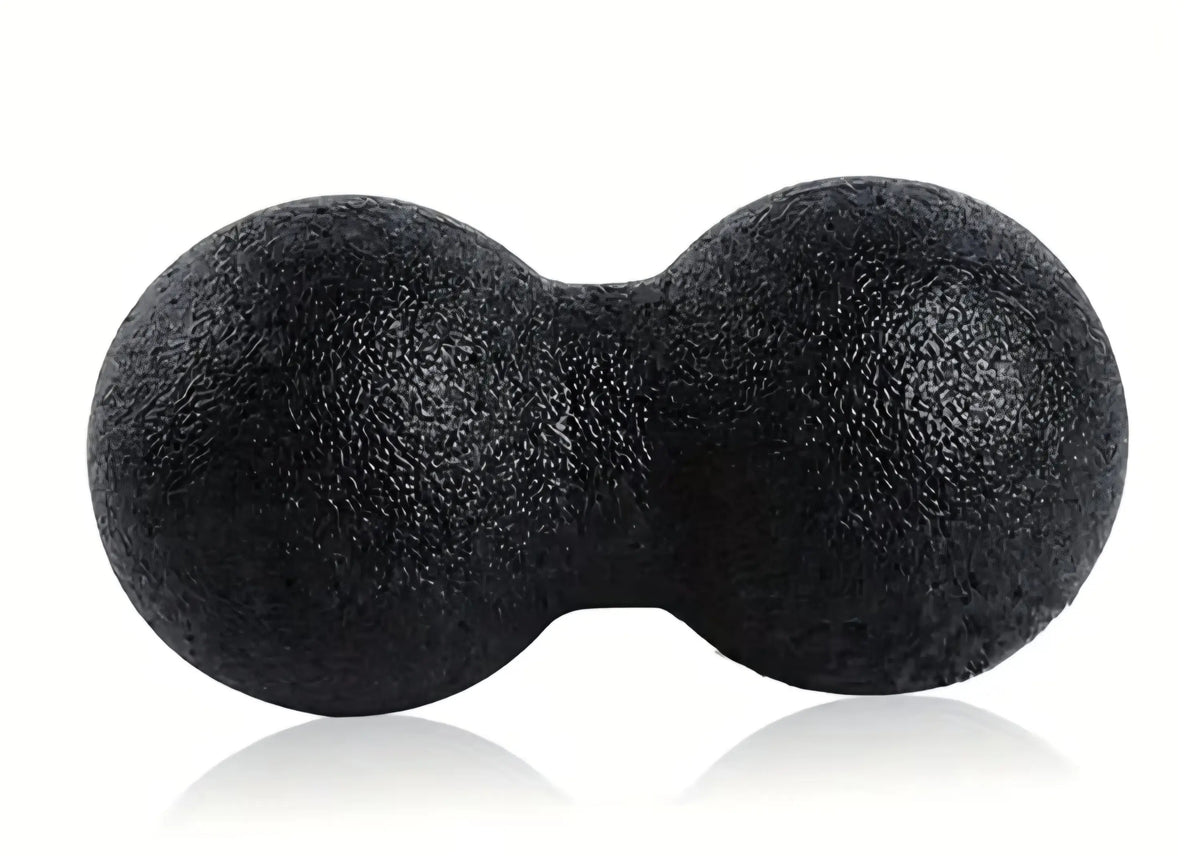 Black textured foam myofascia ball peanut massager with two connected spherical ends for targeted muscle relief