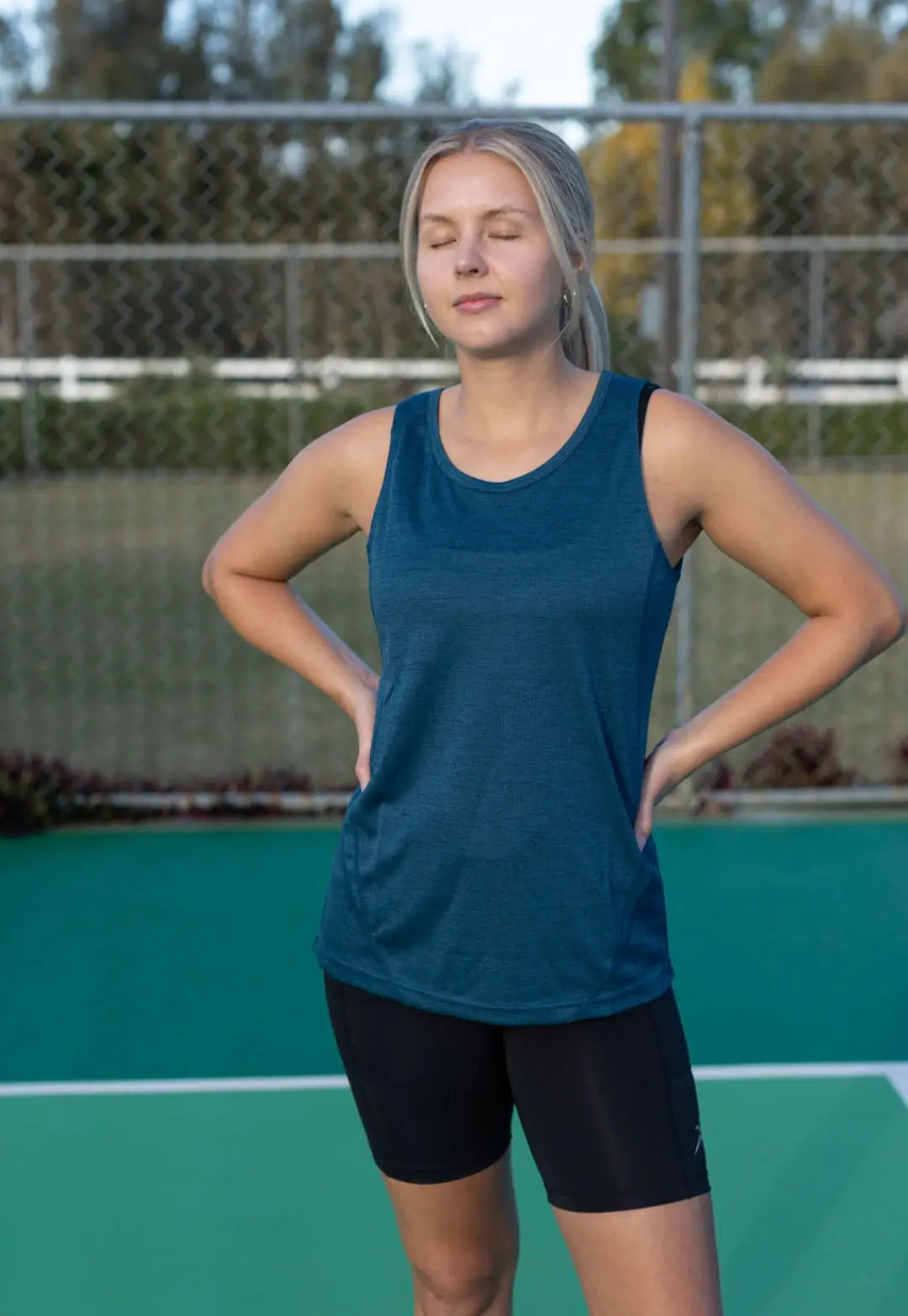 Challenger full back singlet. Lightweight, breathable, and crafted from 100% Polyester, Available in Red Marle, Teal Marle, Navy Marle