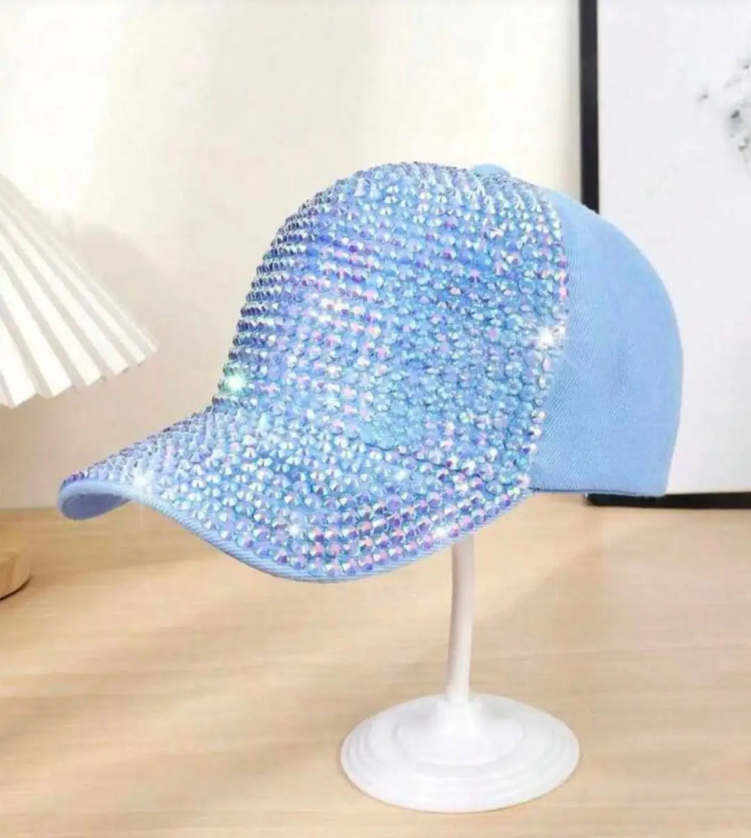 Light blue baseball cap with sparkling rhinestones on front and brim from rhinestone peaks vibrant collection