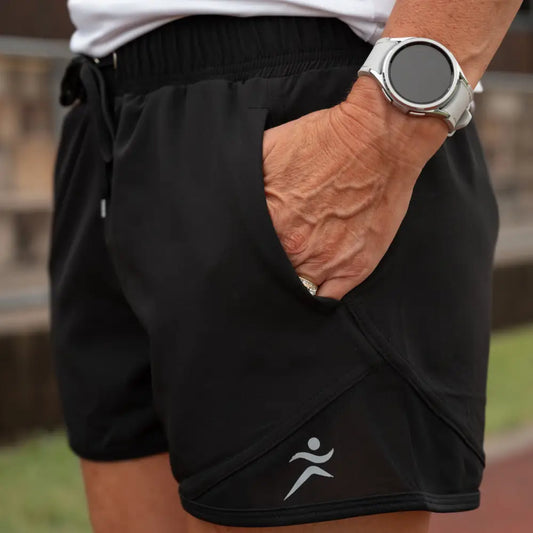 Lightweight running shorts featuring breathable mesh briefs for comfort, two convenient side pockets, and an adjustable drawstring waist.