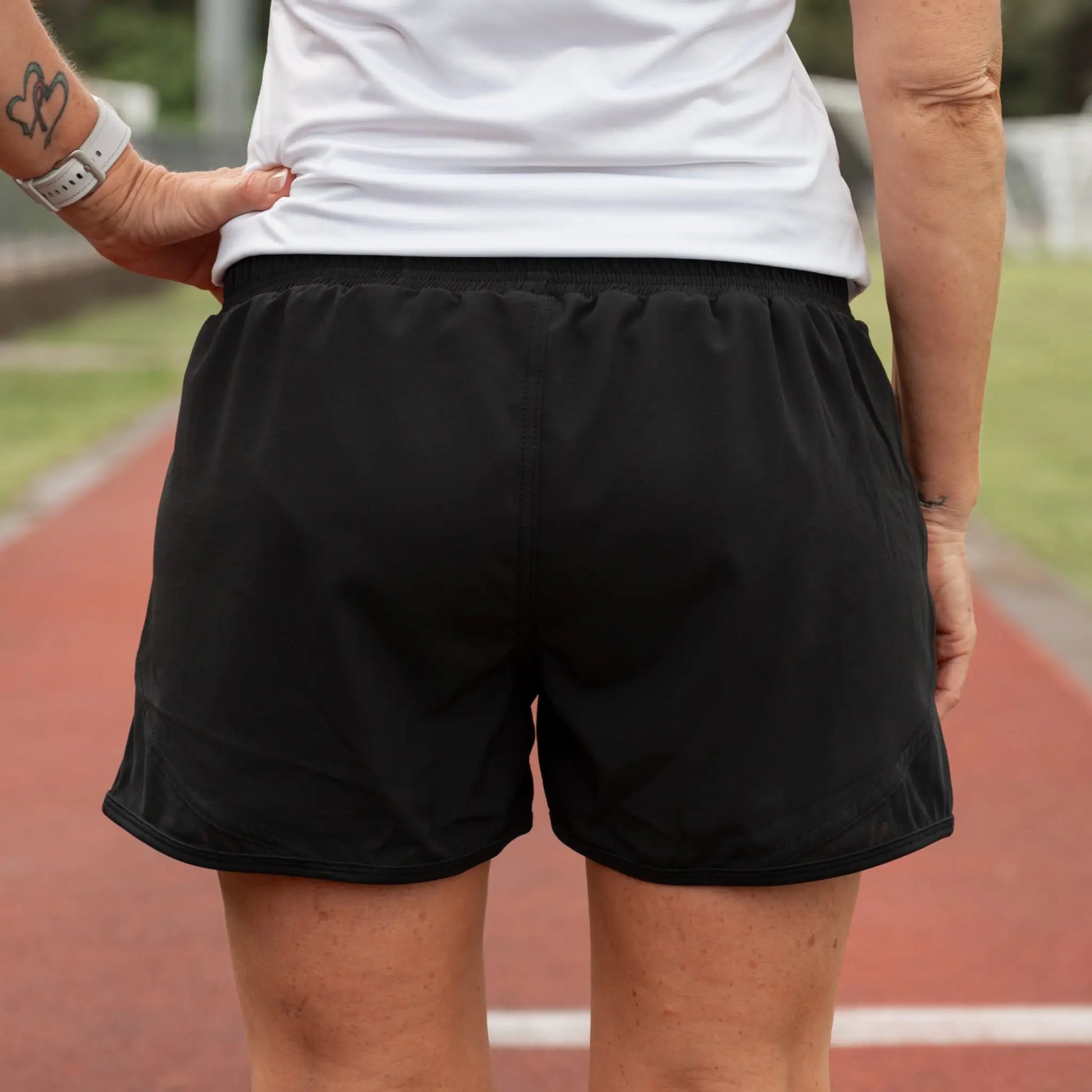 Lightweight running shorts featuring breathable mesh briefs for comfort, two convenient side pockets, and an adjustable drawstring waist.
