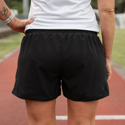 Lightweight running shorts featuring breathable mesh briefs for comfort, two convenient side pockets, and an adjustable drawstring waist.