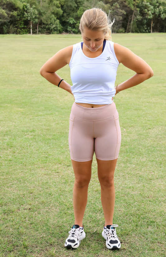 The 'Latte' Active Bike Short is a firm high rise active short designed to firmly hug the body. These mid thigh length shorts feature flat lock stitching for the ultimate comfort plus a wide stretch comfy waistband that features a drawstring for the perfect fit. Moisture wicking fabric treatment to keep you cool and dry.
