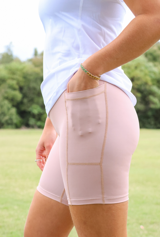 The 'Latte' Active Bike Short is a firm high rise active short designed to firmly hug the body. These mid thigh length shorts feature flat lock stitching for the ultimate comfort plus a wide stretch comfy waistband that features a drawstring for the perfect fit. Moisture wicking fabric treatment to keep you cool and dry.