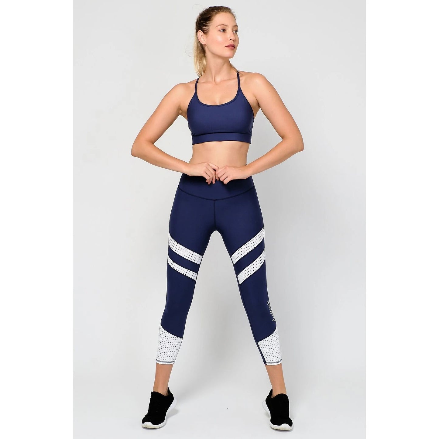  Blurred Lines Tight! With a supportive and high waisted performance fit, you’ll feel ready for anything that comes your way! The white mesh panels add breathability and statement style. 