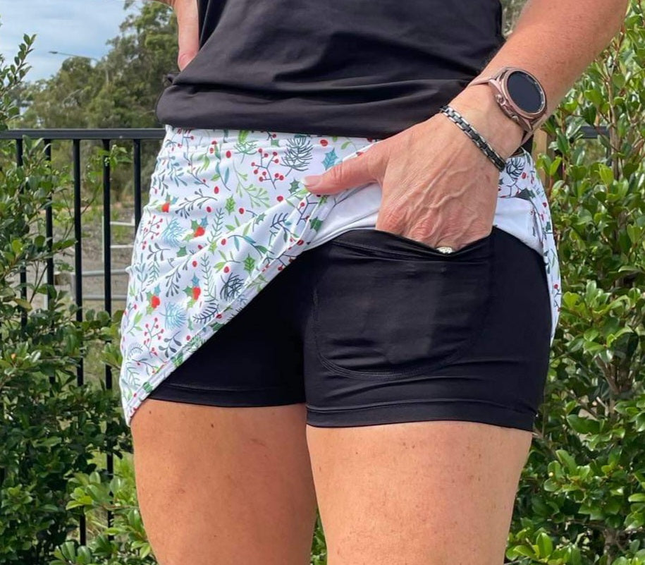 Gmaxx Skorts. Christmas Holly design on a white background . Undershorts with two pockets. Ideal for Golf, Pickleball, Tennis